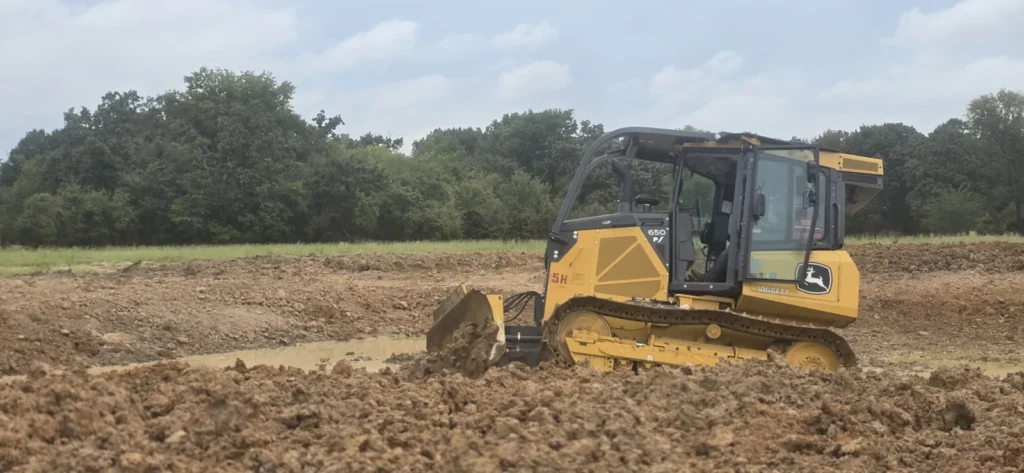 Bulldozer clearing an East Texas property for winter land preparation